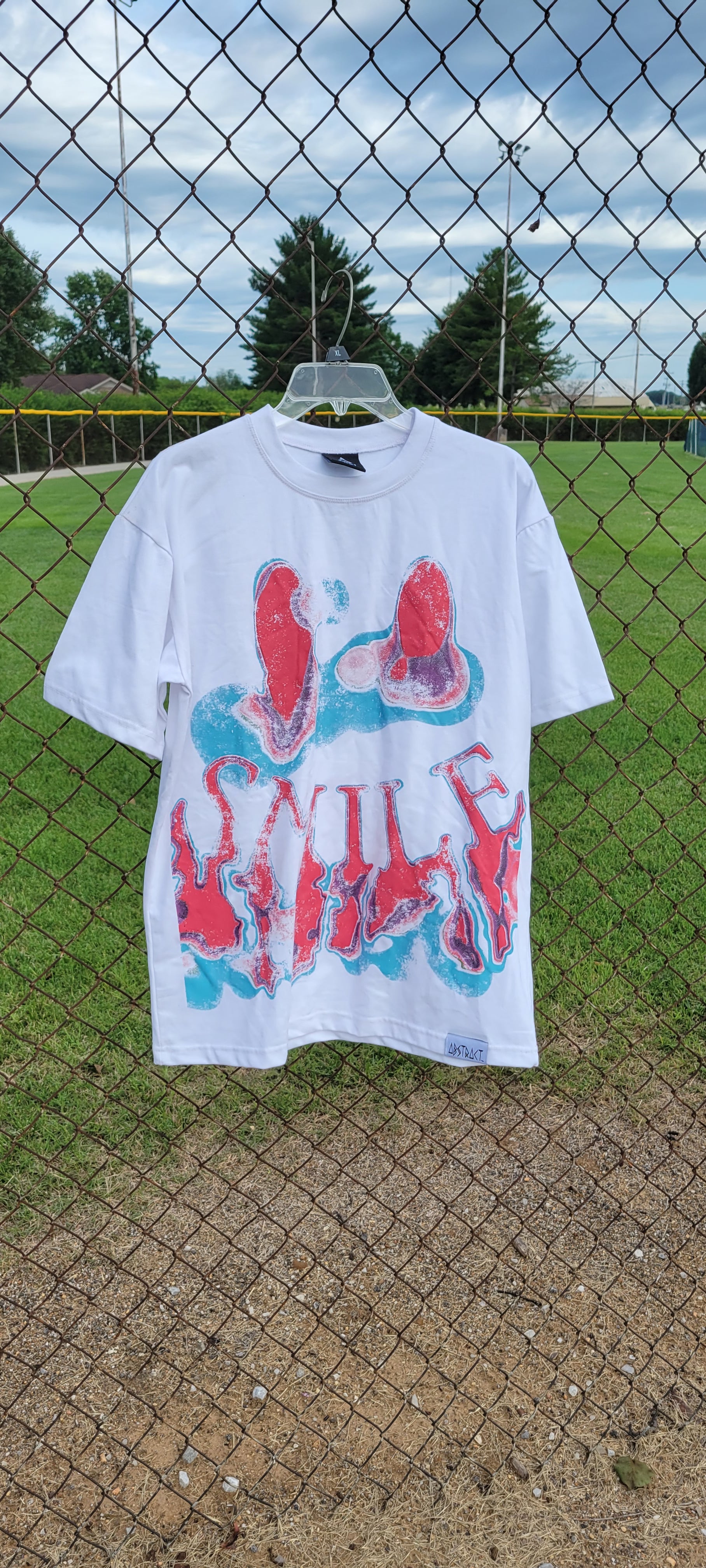 Smile Premium Oversized Tee by Abstract Lyfestyle Ltd Co T-Shirt Yellow / Small,White/Red/Black / Small,White/Red/Blue / Small,Yellow / Medium,Yellow / Large,Yellow / XL,Yellow / 2XL,White/Red/Black / Medium,White/Red/Black / Large,White/Red/Black / XL,White/Red/Black / 2XL,White/Red/Blue / Medium,White/Red/Blue / Large,White/Red/Blue / XL,White/Red/Blue / 2XL,Yellow / 3XL,White/Red/Black / 3XL,White/Red/Blue / 3XL Dark Gray